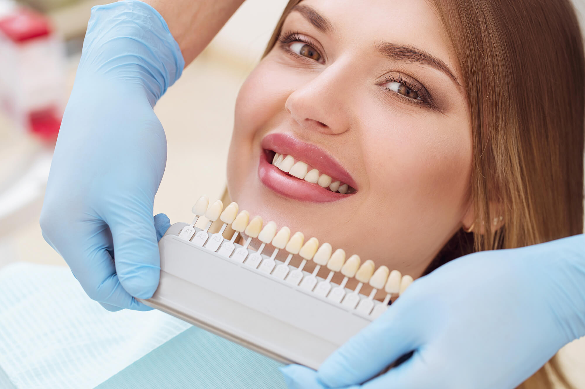 cosmetic dentist finding the perfect dental crown Wendell color for the patient