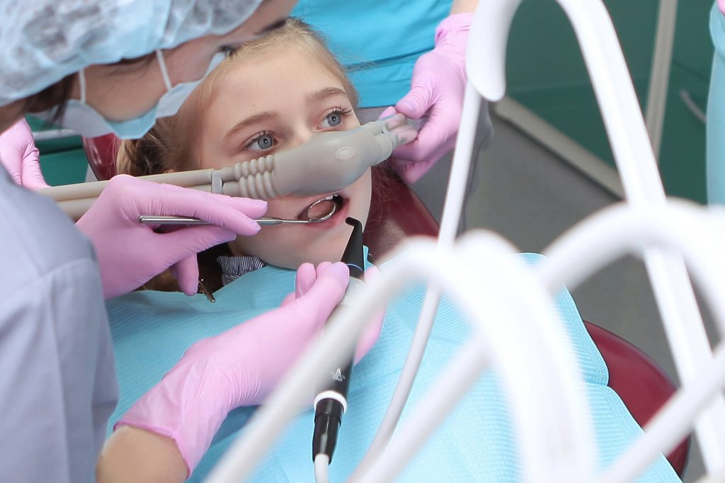 a little girl receiving Sedation Dentistry