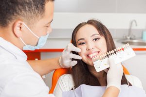 woman getting a Dental Crown in Zebulon for chipped tooth Tooth Bonding Dental Services