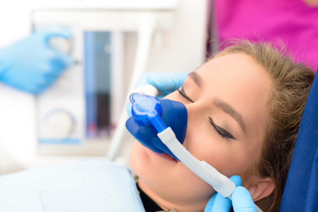 Woman undergoing sedation dentistry in Wilson