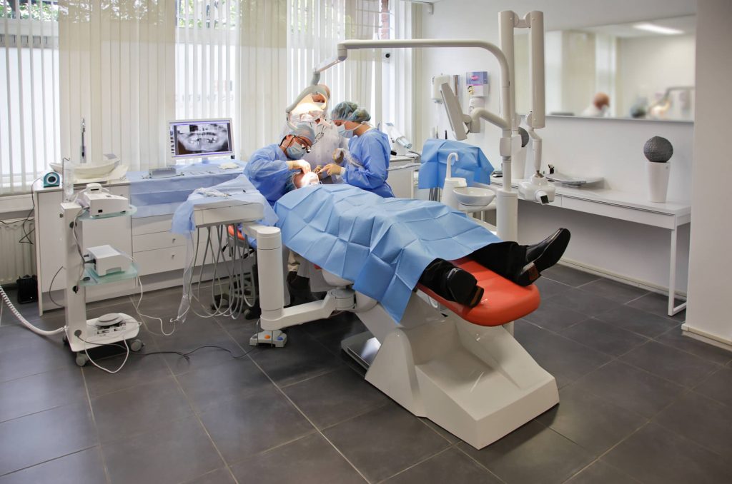 dental team performing dental implants in Wendell surgery