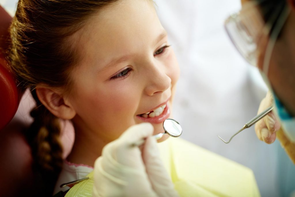 pediatric dentist in Raleigh with kid patient