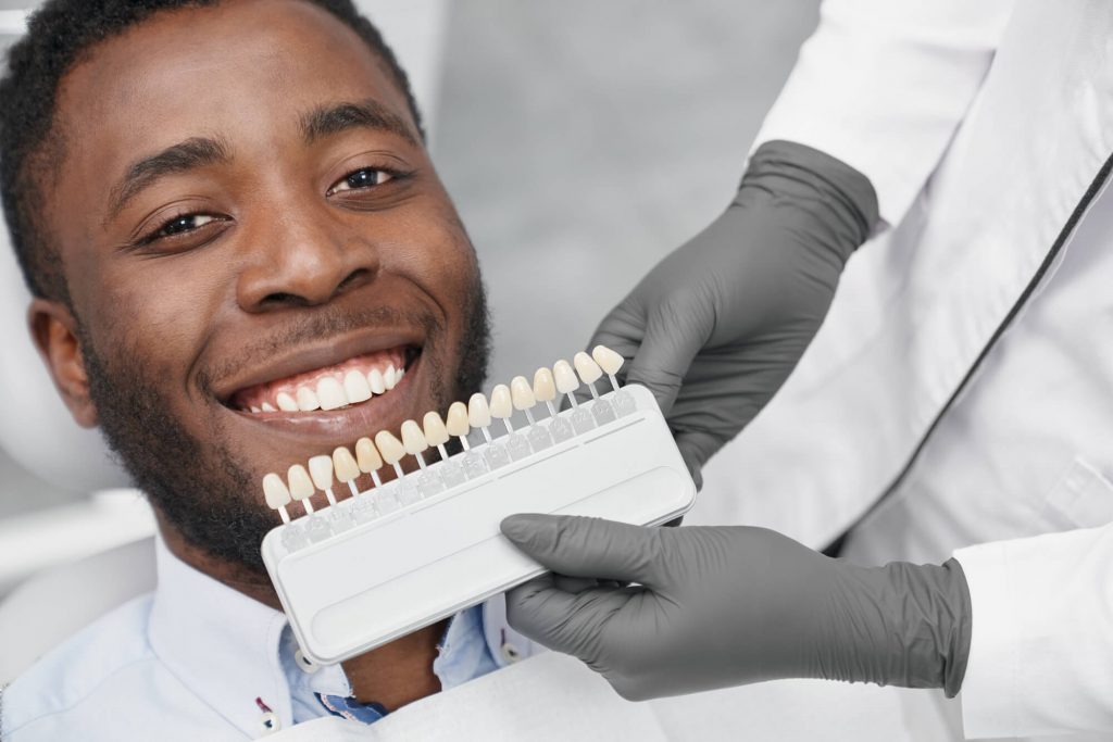 dentist in Raleigh preparing patient